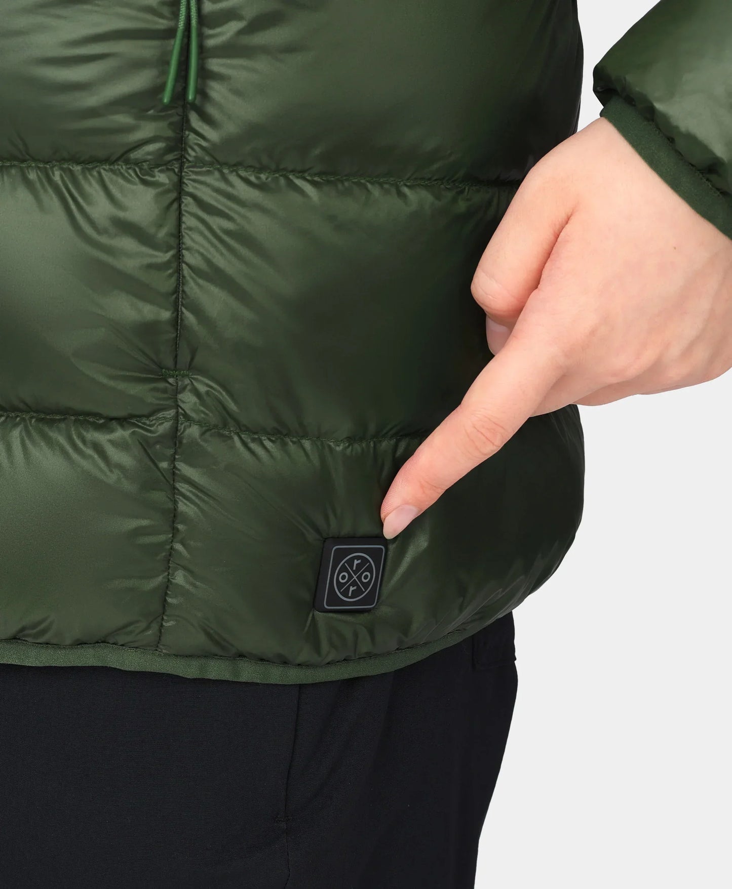 Discrete power button located near left hem